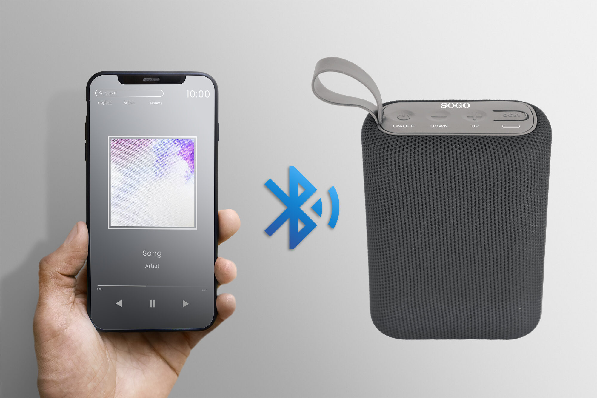 Hand holding smartphone connect to bluetooth speaker
